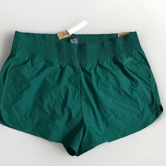Victoria's Secret PINK Active Green Lined Dolphin Hem running shorts New - Picture 1 of 5